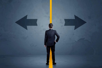 Business person choosing between two options