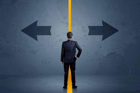 Business person choosing between two options