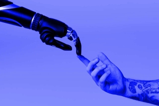 A robotic hand shaking a human hand on a blue background