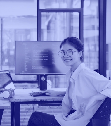 A Girl Smiling while working