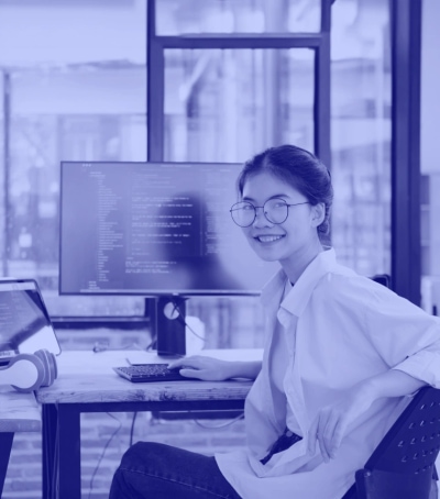 A Girl Smiling while working